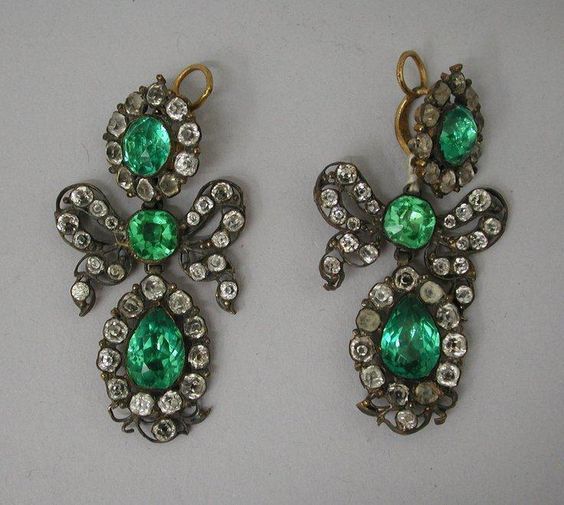 a pair of 18th century paste bow earrings set with green and white paste