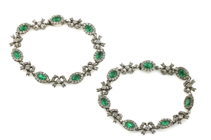 a matched pair of georgian paste and silver bracelets in an alternating bow and halo motif