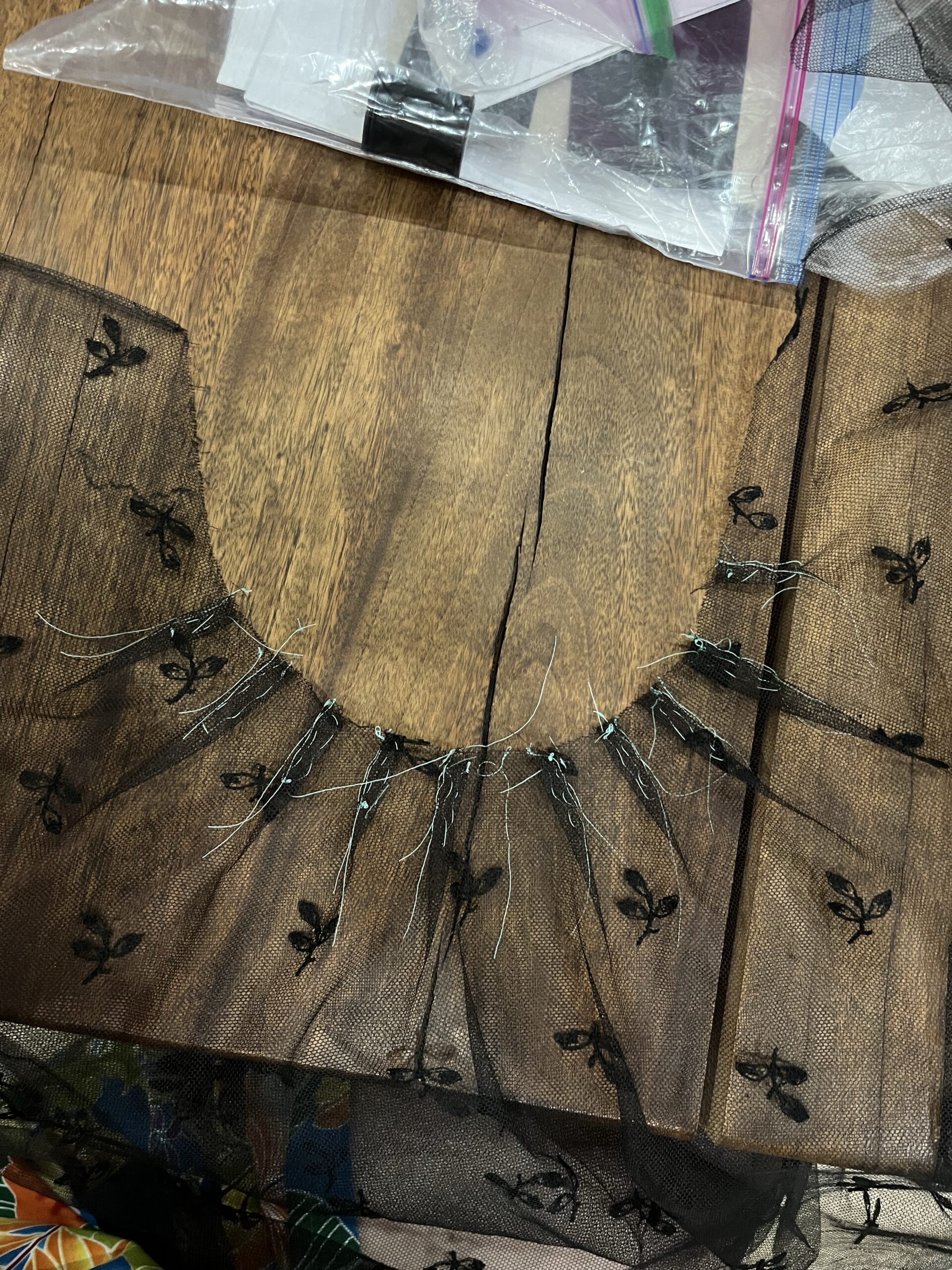 close-up view of the pleated neckline of a mantelet