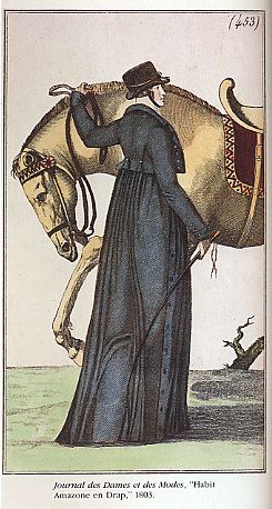 1803 fashion plate of a woman in a navy blue riding habit and standing next to a horse