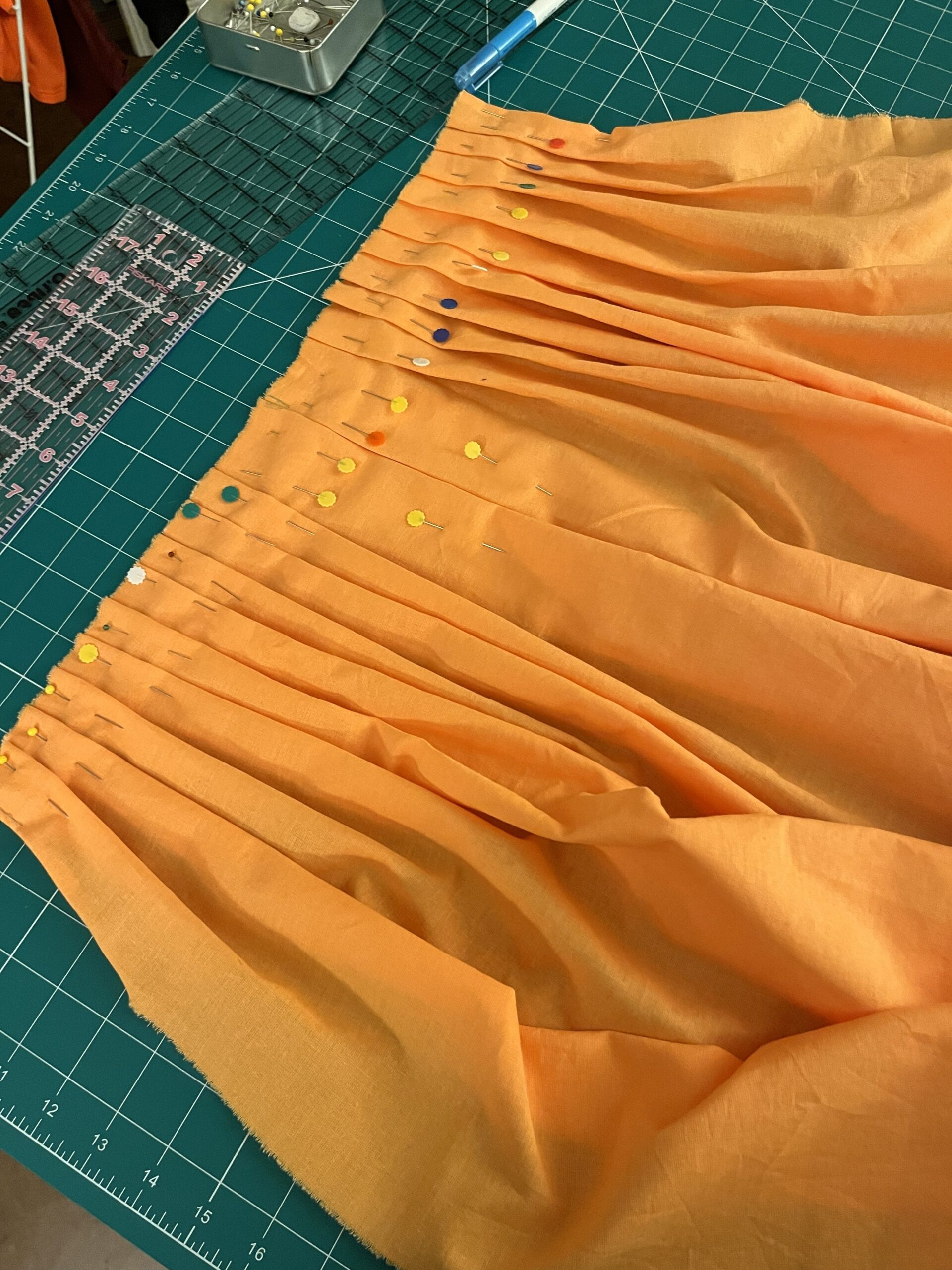 a pleated 18th century petticoat back panel