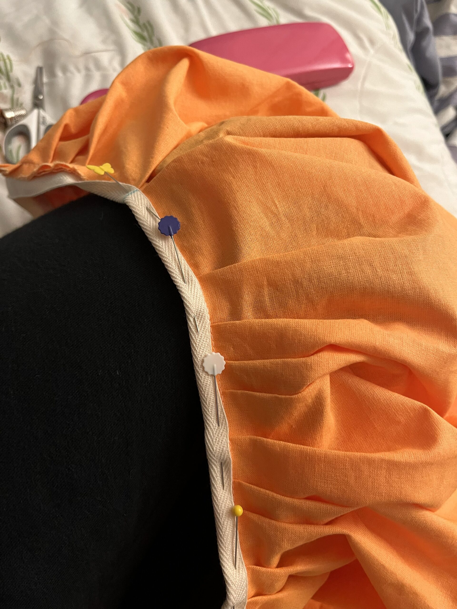 an 18th century petticoat with a pinned waistband ready for whipping down