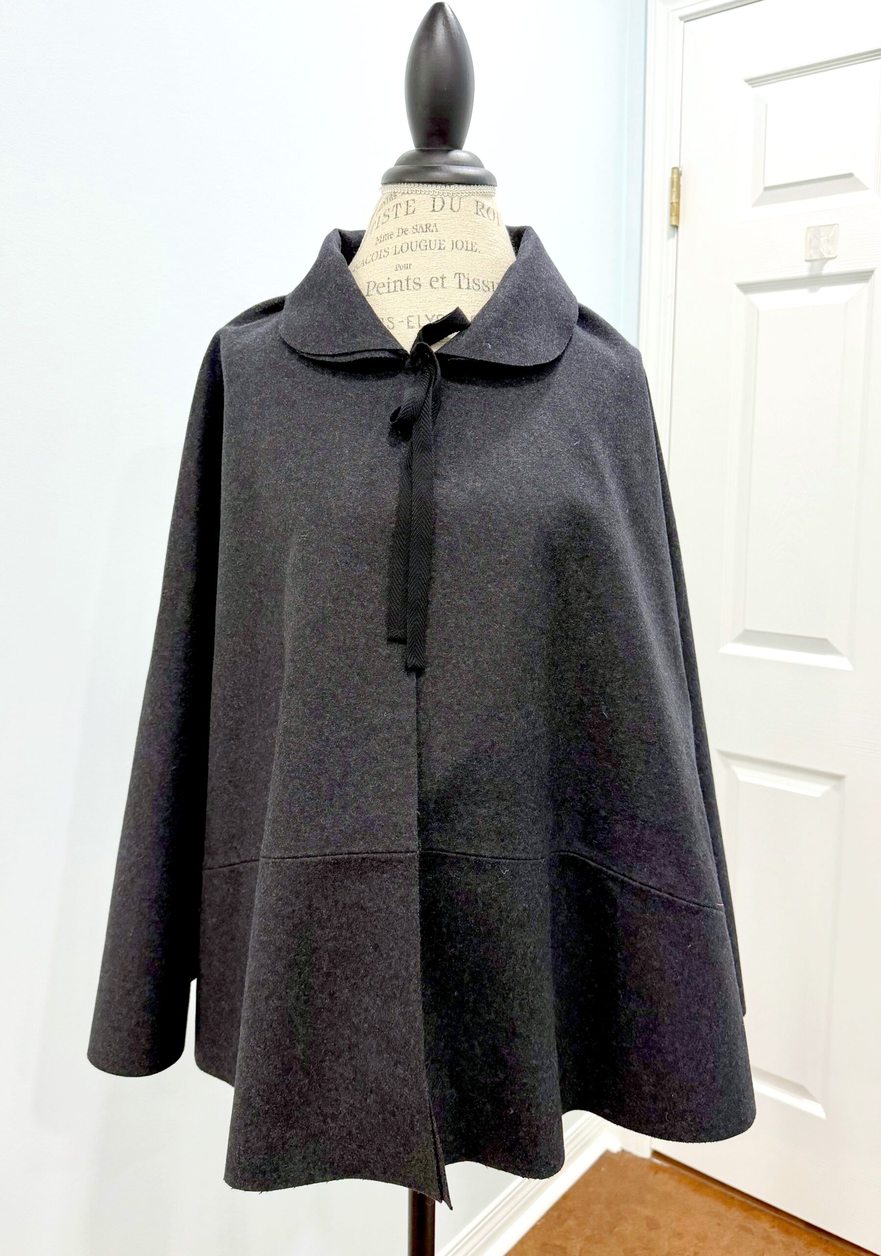 Front view of the Burnley and Trowbridge 18th Century Short Cloak in charcoal wool