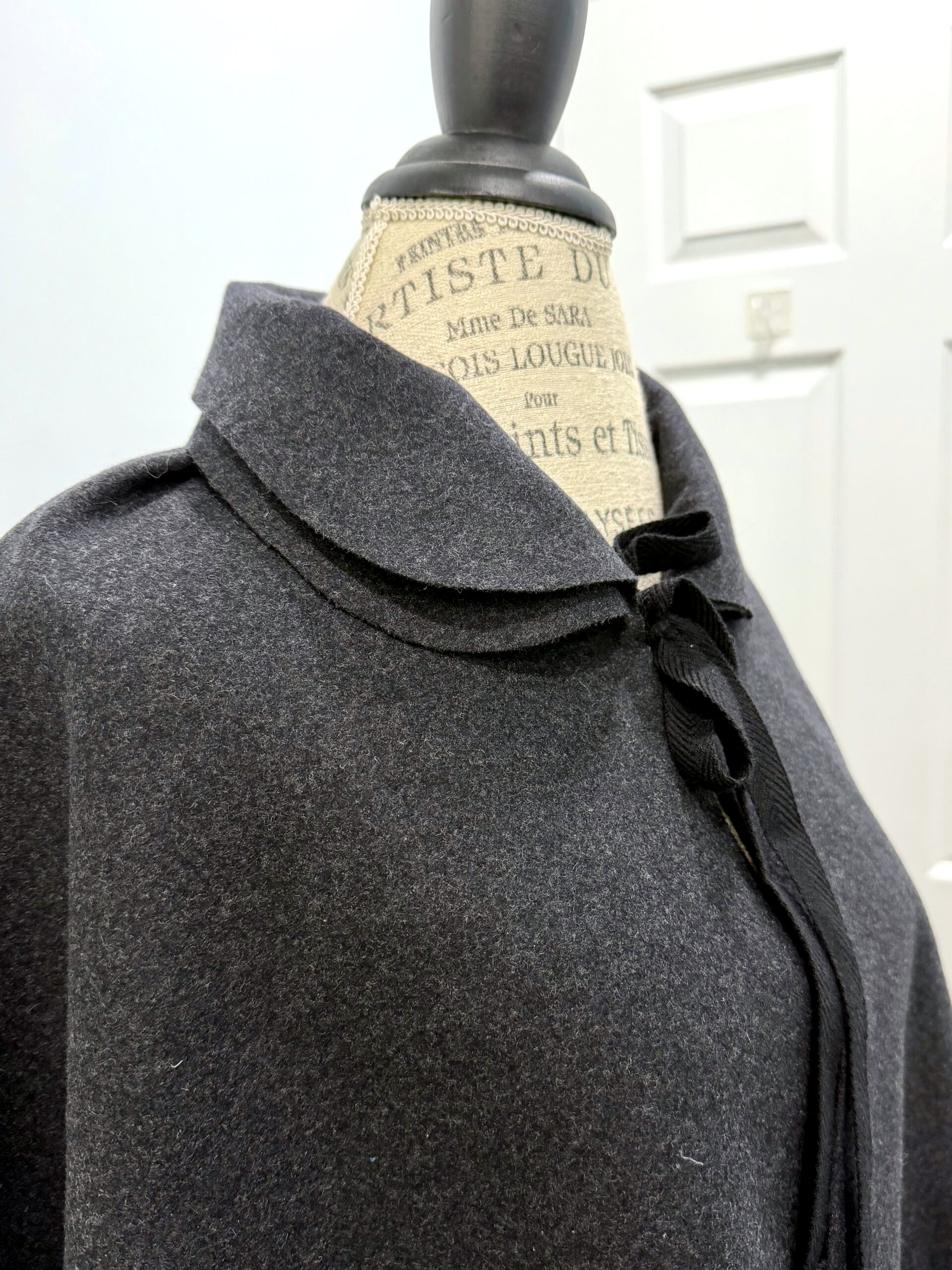 close-up of the double collar on the Burnley and Trowbridge 18th Century Short Cloak in charcoal wool