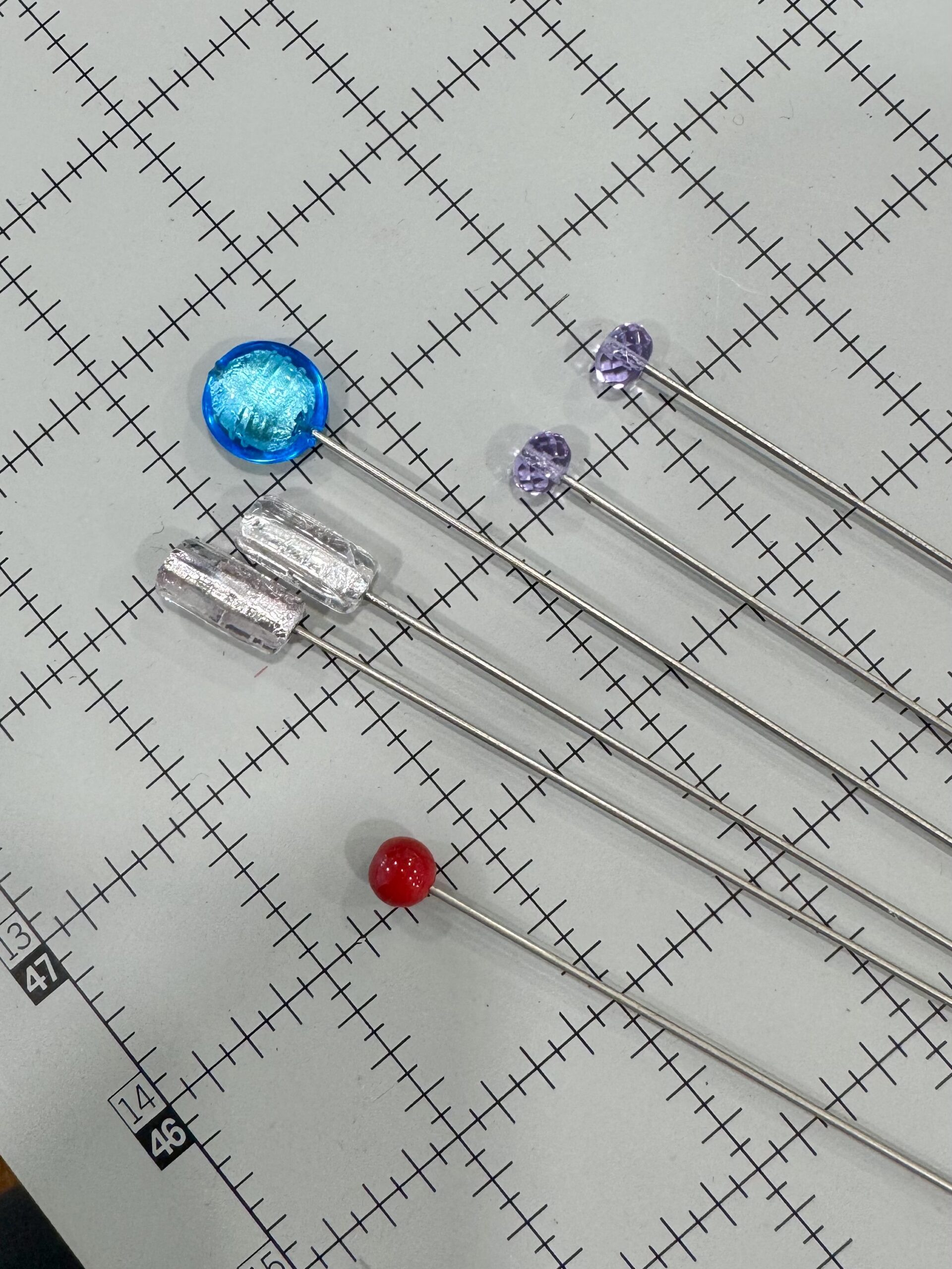 Hat pins with beads glued to the ends